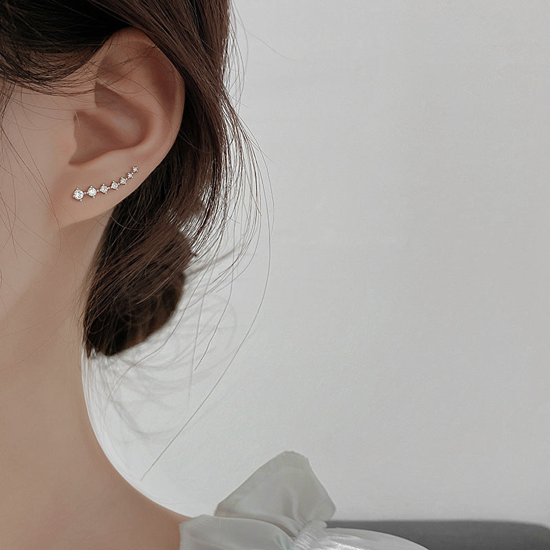 Boucles d'oreilles à tige en diamant sept étoiles