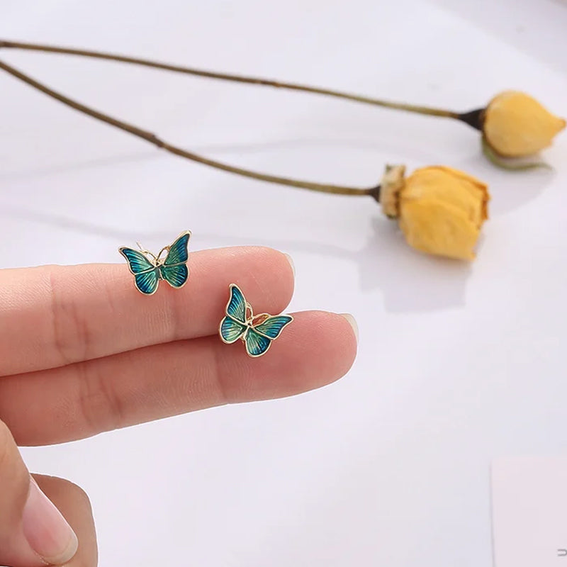 Boucles d'oreilles papillon bleues et dorées