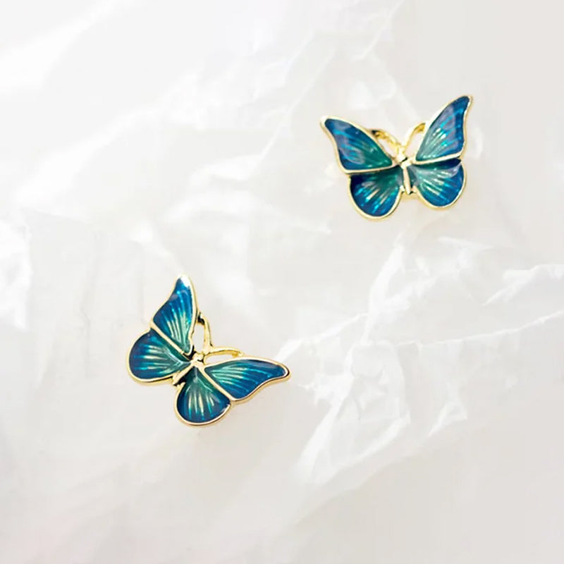 Boucles d'oreilles papillon bleues et dorées