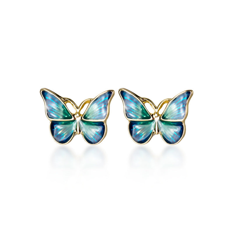 Boucles d'oreilles papillon bleues et dorées